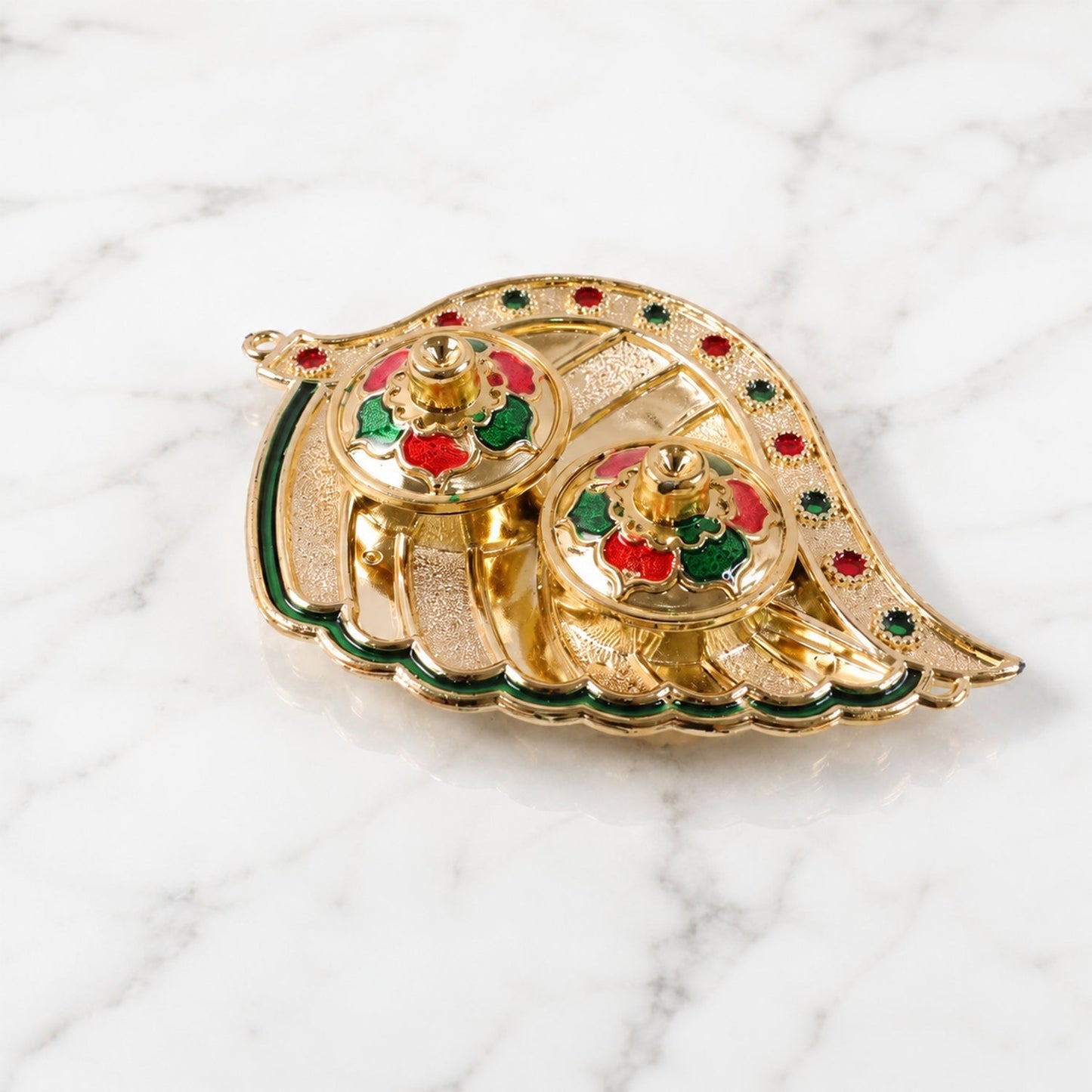 Kankavati holder used in puja ritual setup