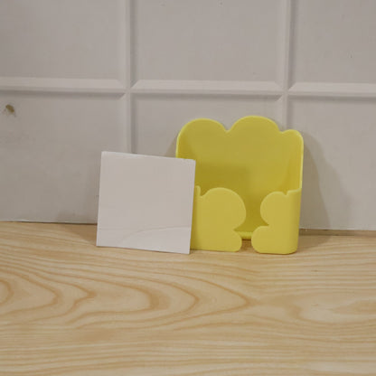 Product packaging highlighting key features of the wall mount holder.