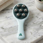 Ergonomic handheld body massager with 7 stainless steel balls.