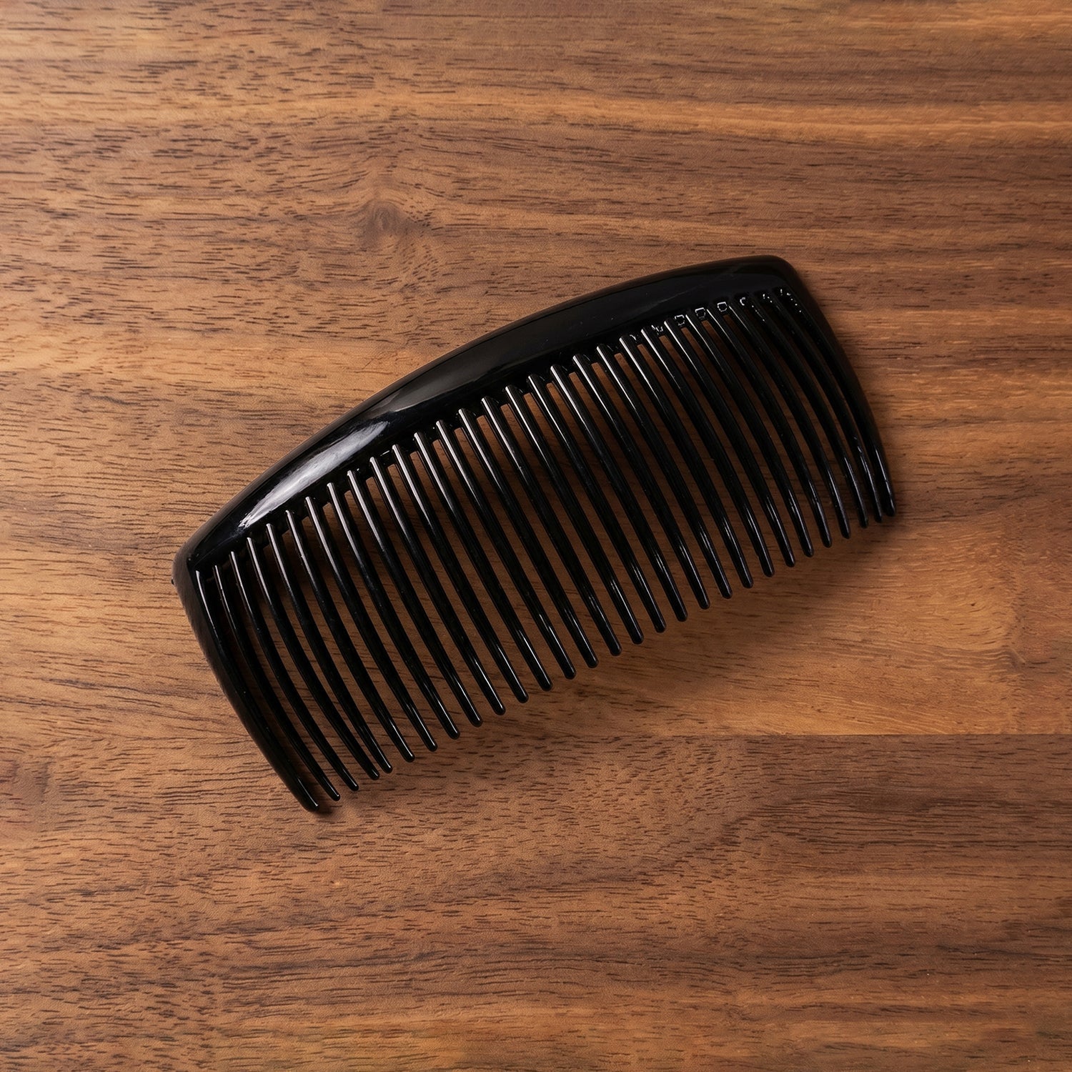 Plastic hair styling side comb with fine teeth for secure updos