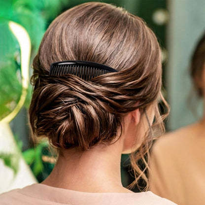 Women hairstyle using side hair comb during styling
