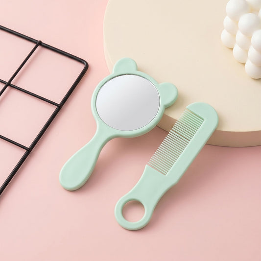 Cute bear-shaped handheld mirror in mint with matching comb in grooming kit