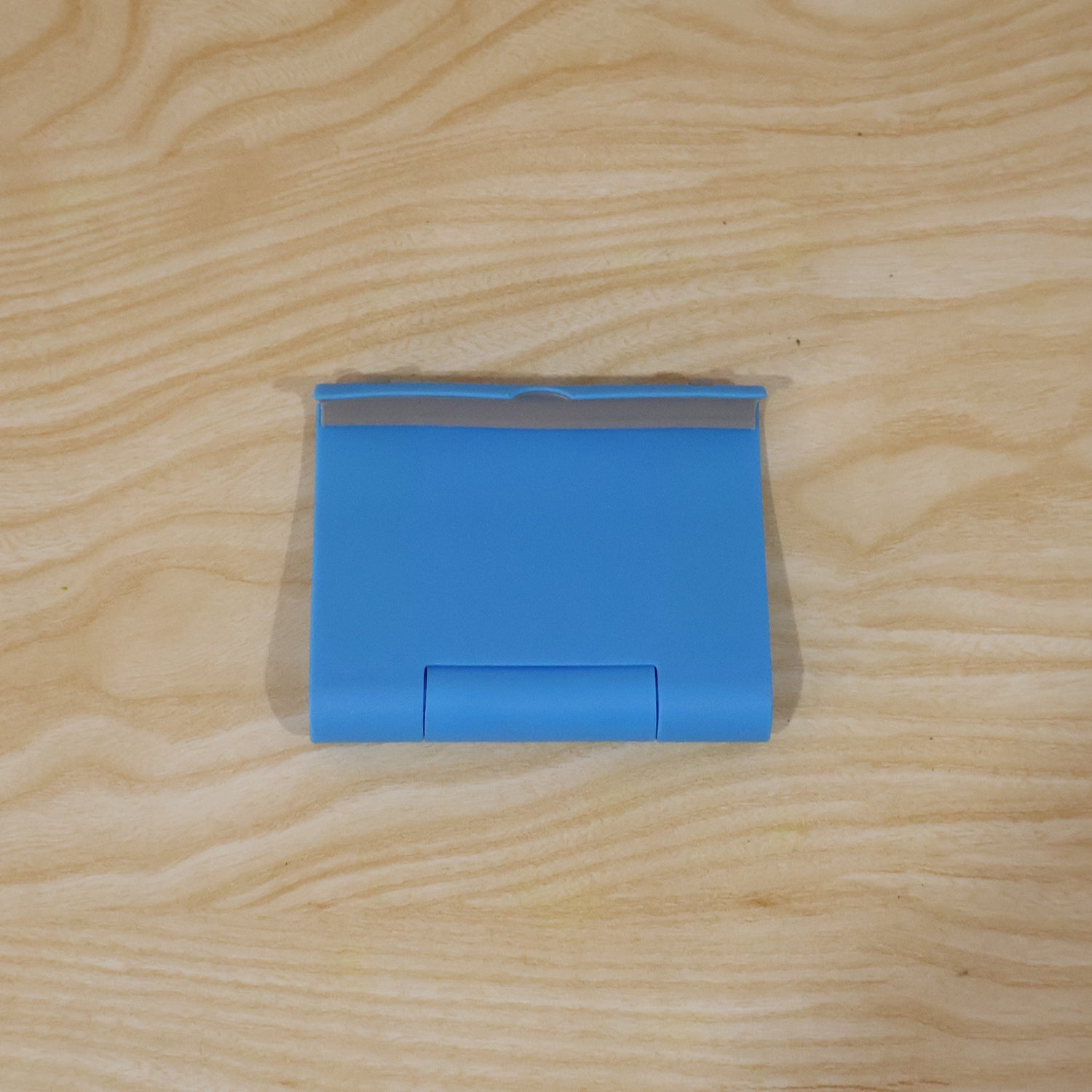 Foldable phone stand pack box.