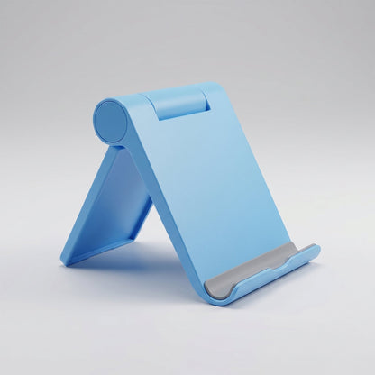 Foldable mobile phone stand in packing box.