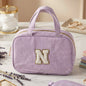 Hanging multi-pocket travel toiletry bag showcasing multiple compartments