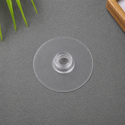 Transparent self-adhesive wall hook demonstrating strong hold