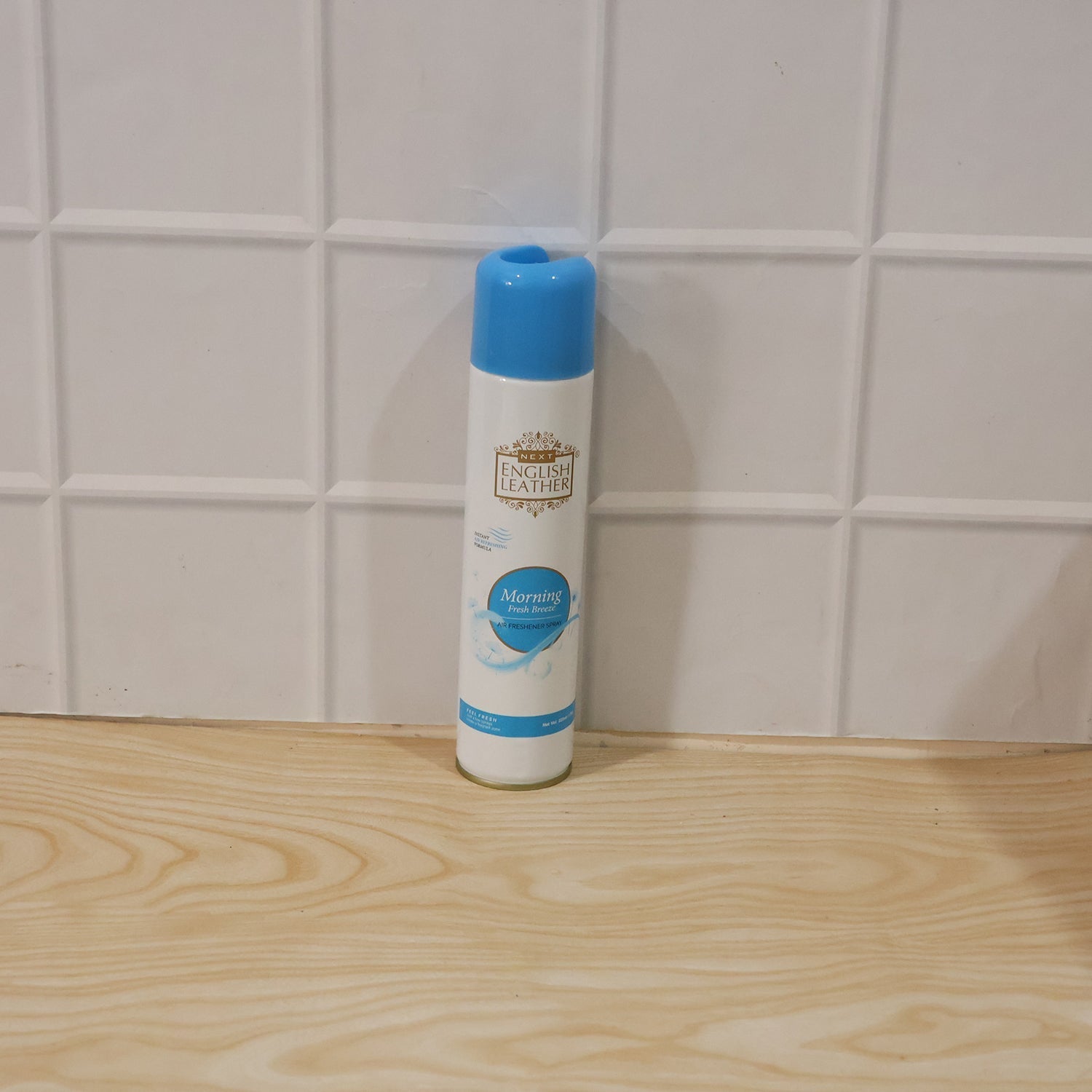 Air freshener spray can emitting a fresh aroma in a room