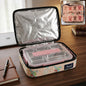 Open travel organizer bag showing spacious interior with clothes and essentials.