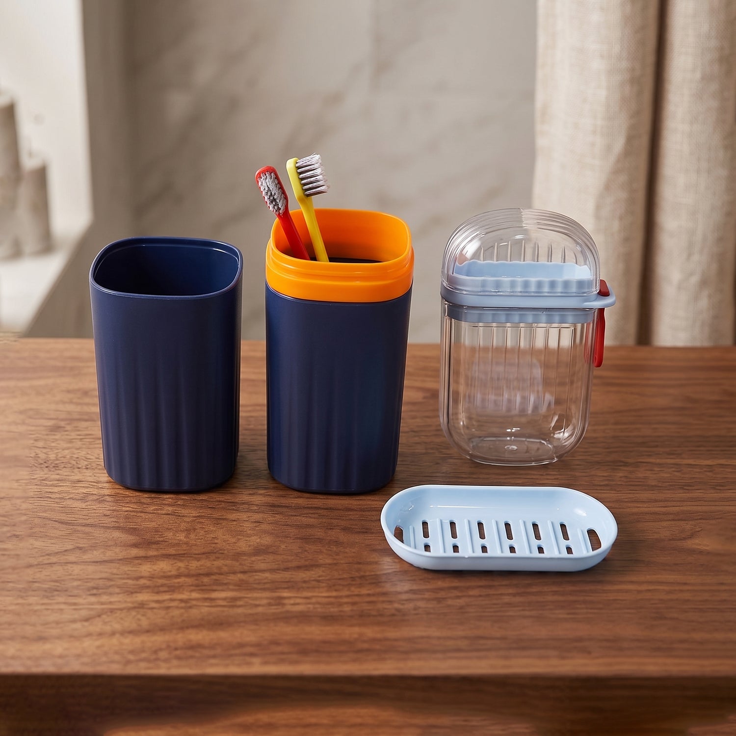 Bathroom accessories combo set in navy blue, includes tumbler, toothbrush holder, soap dish