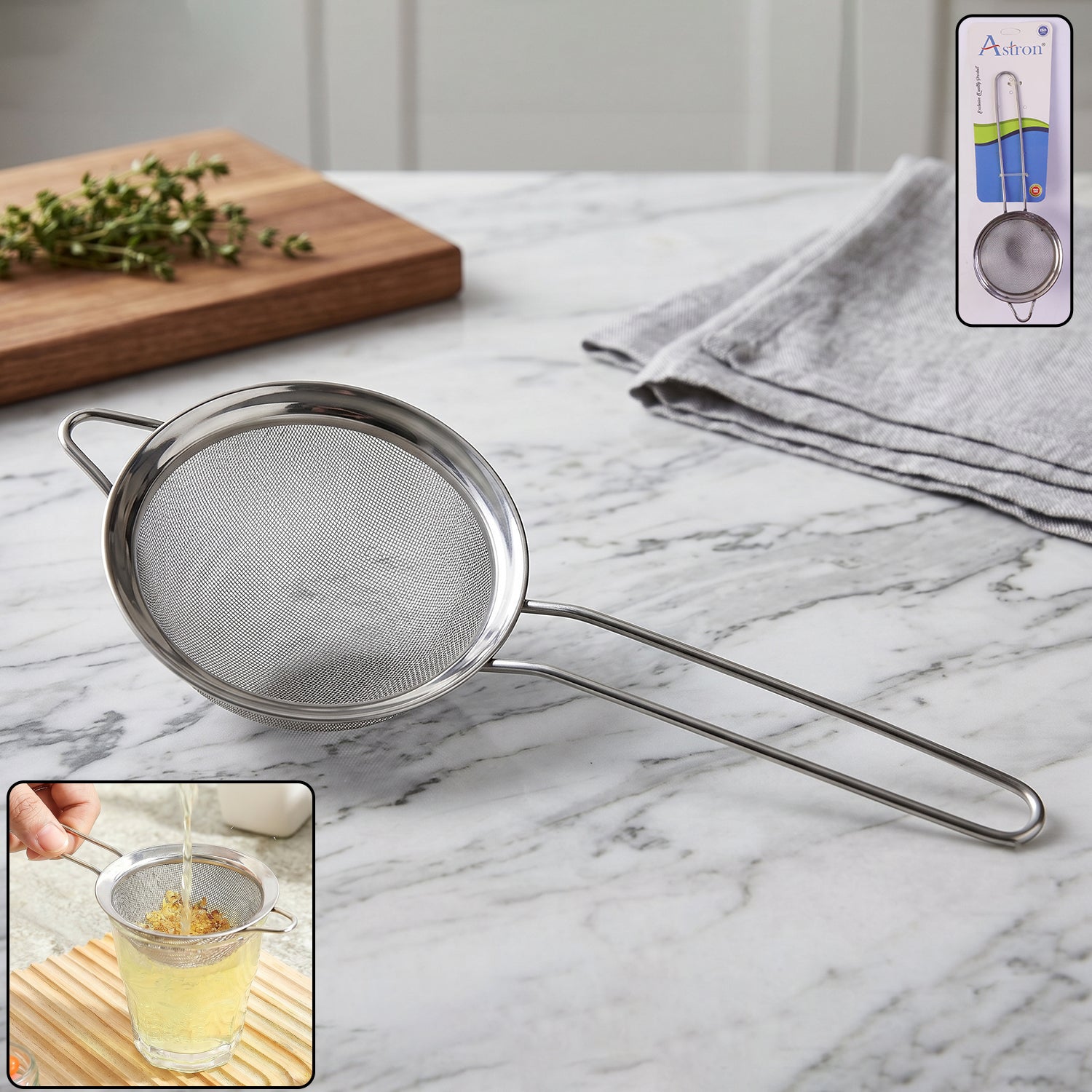 Close-up of stainless steel tea strainer with ergonomic long handle
