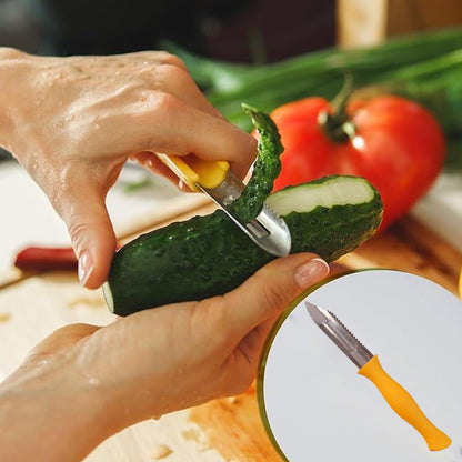 Kitchen knife and peeler in use for peeling vegetables