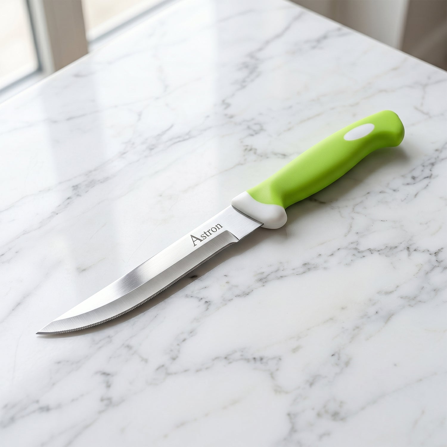Close-up of stainless steel knife with ergonomic handle