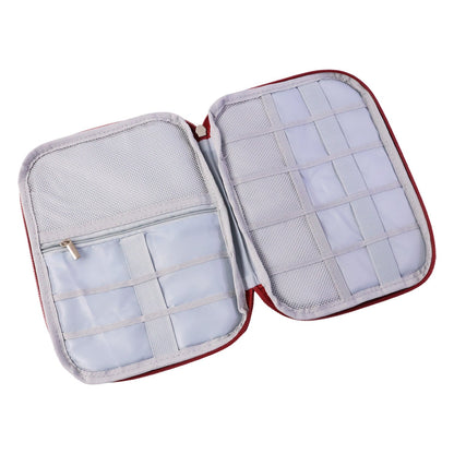 Open view of zip pouch showing multiple storage sections