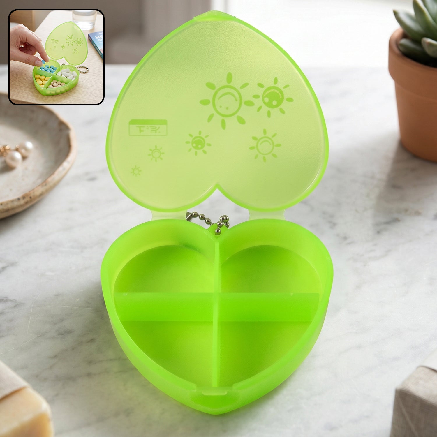 Heart pill box with attached keychain for on-the-go use
