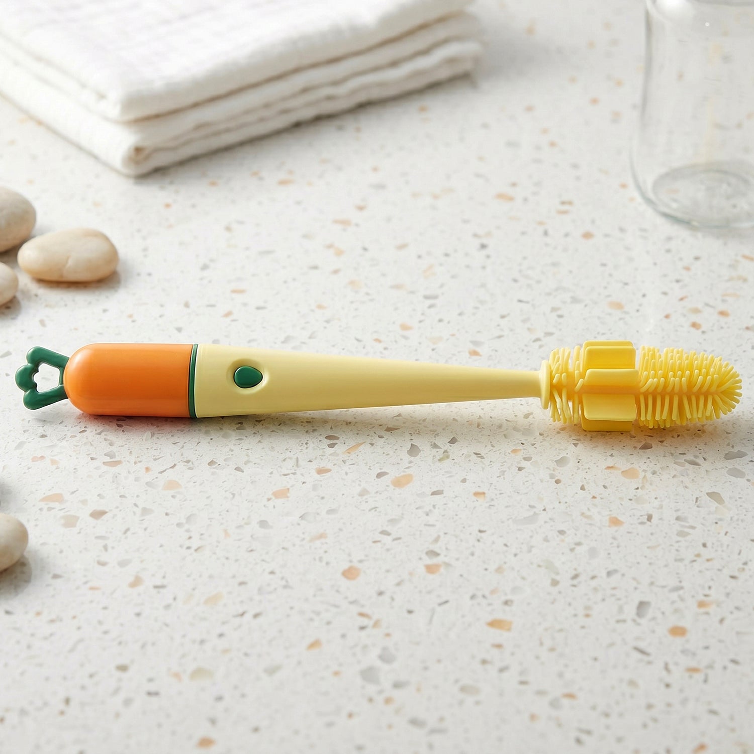 Close-up of bottle cleaning brush highlighting the silicone head and long handle.