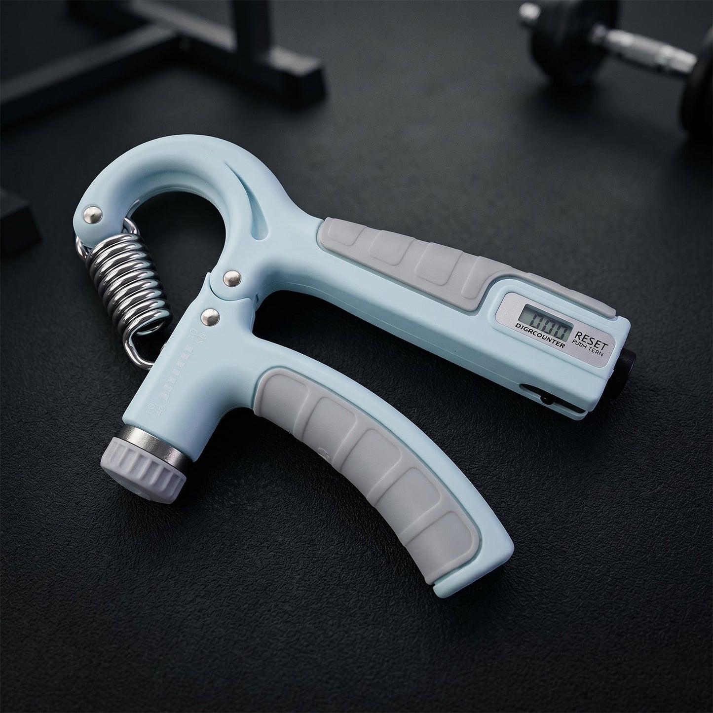 Angled view of hand gripper fitness tool