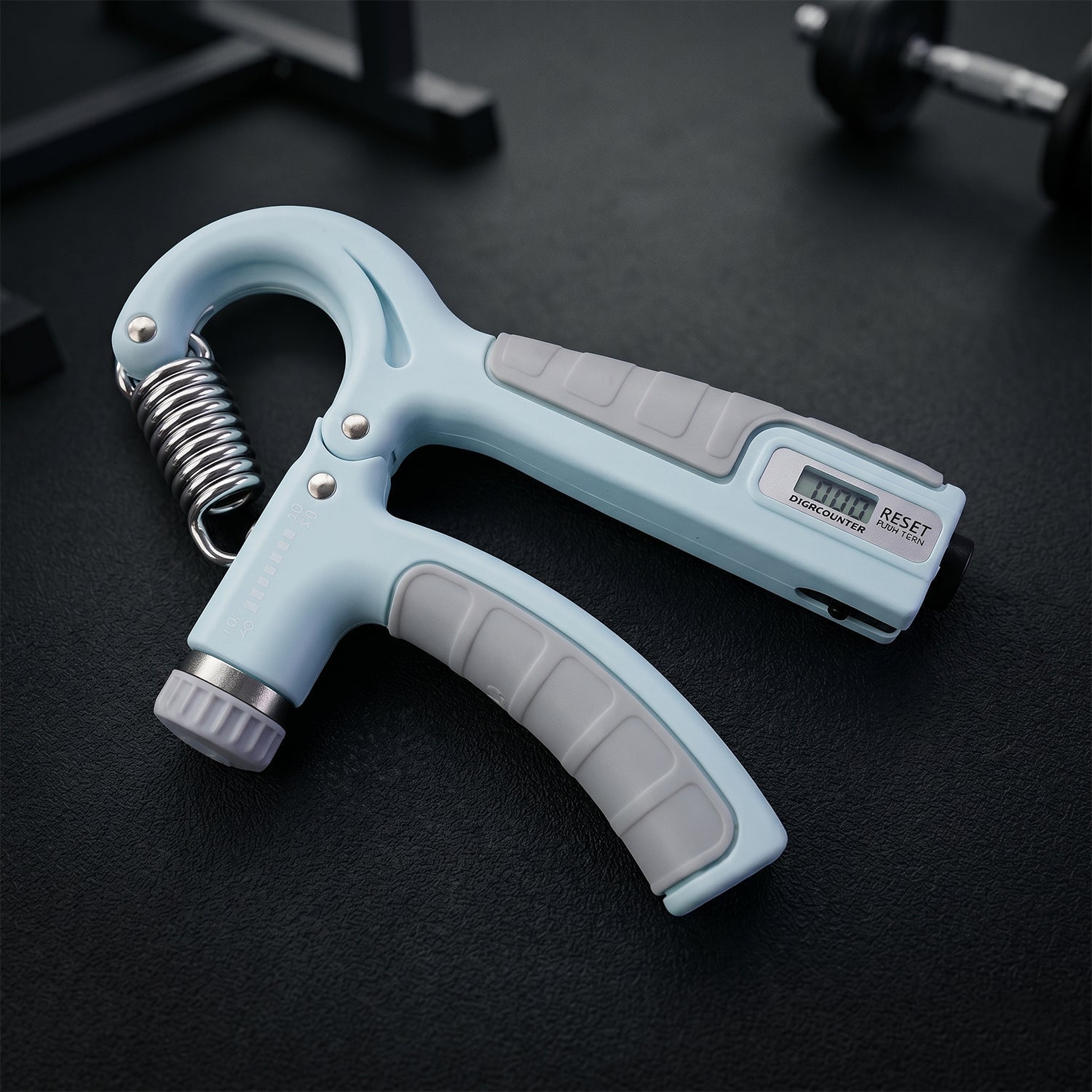 Angled view of hand gripper fitness tool