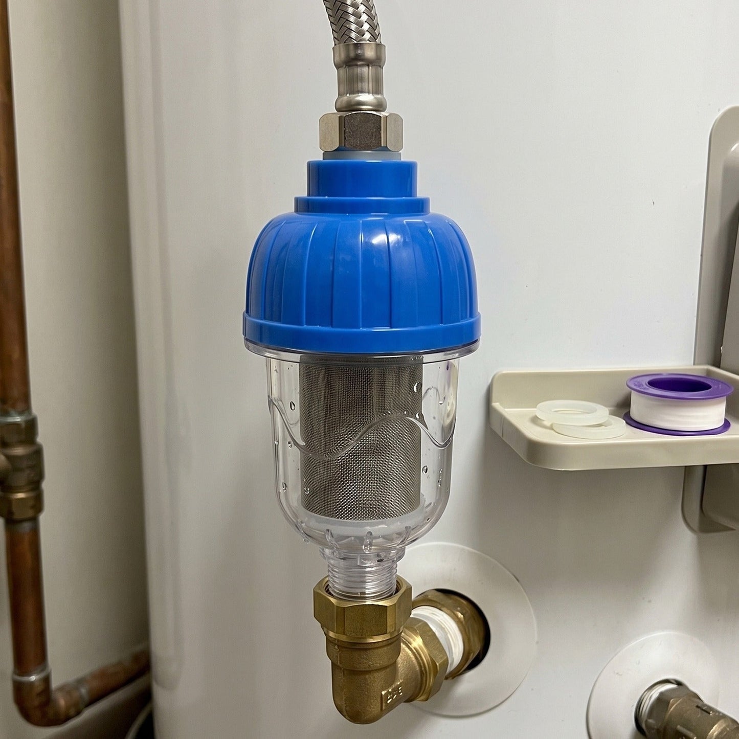 Shower filter in use, purifying bathroom water