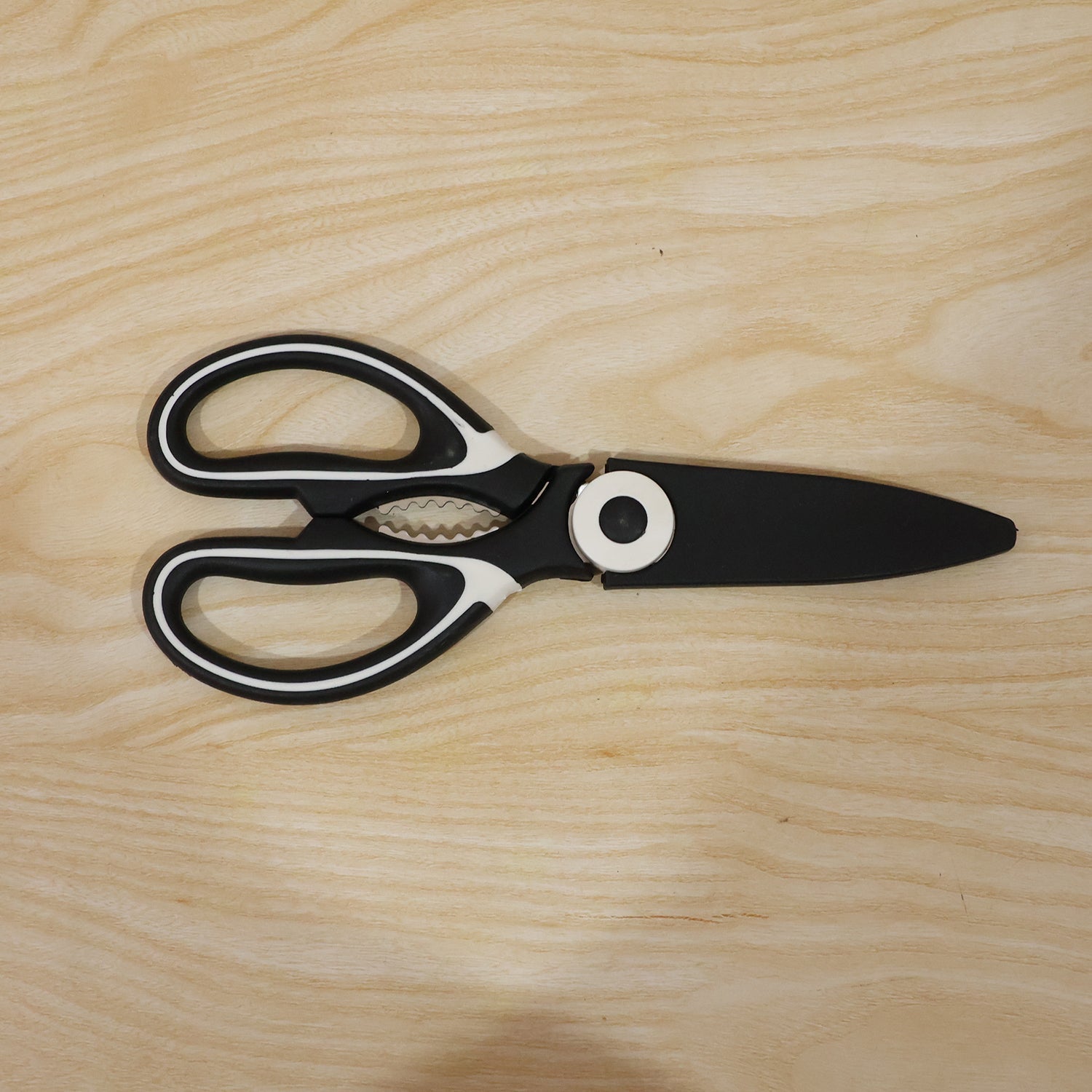 Close-up of stainless steel blades on kitchen scissors