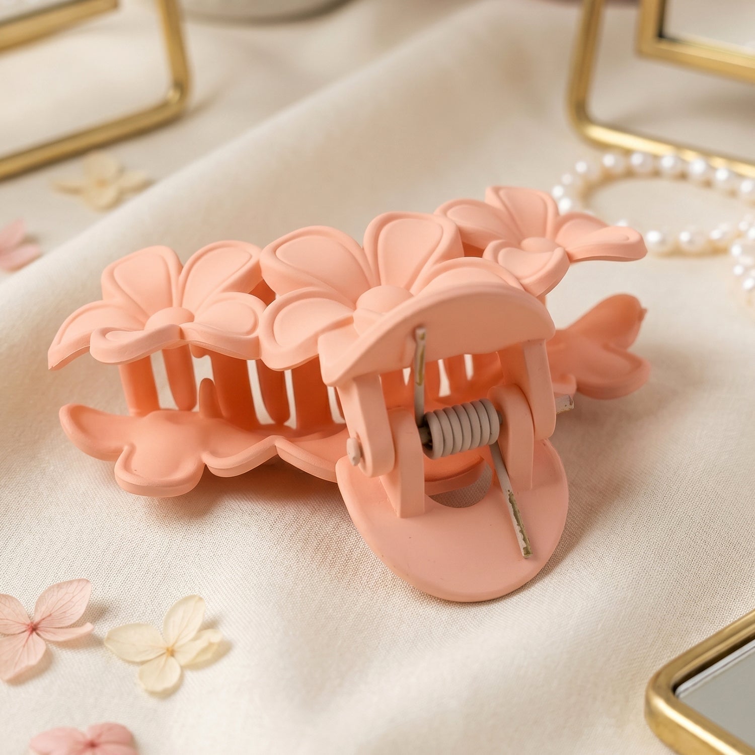Close-up of large pink hair clip detail