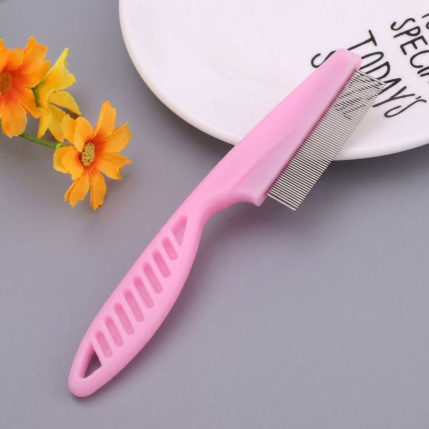 Pet grooming hair removal tool close-up