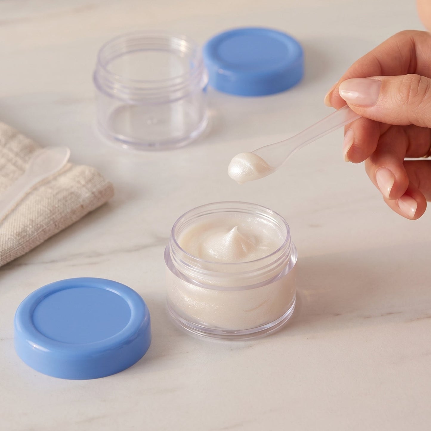 Mini refillable balm and cream jars for travel
