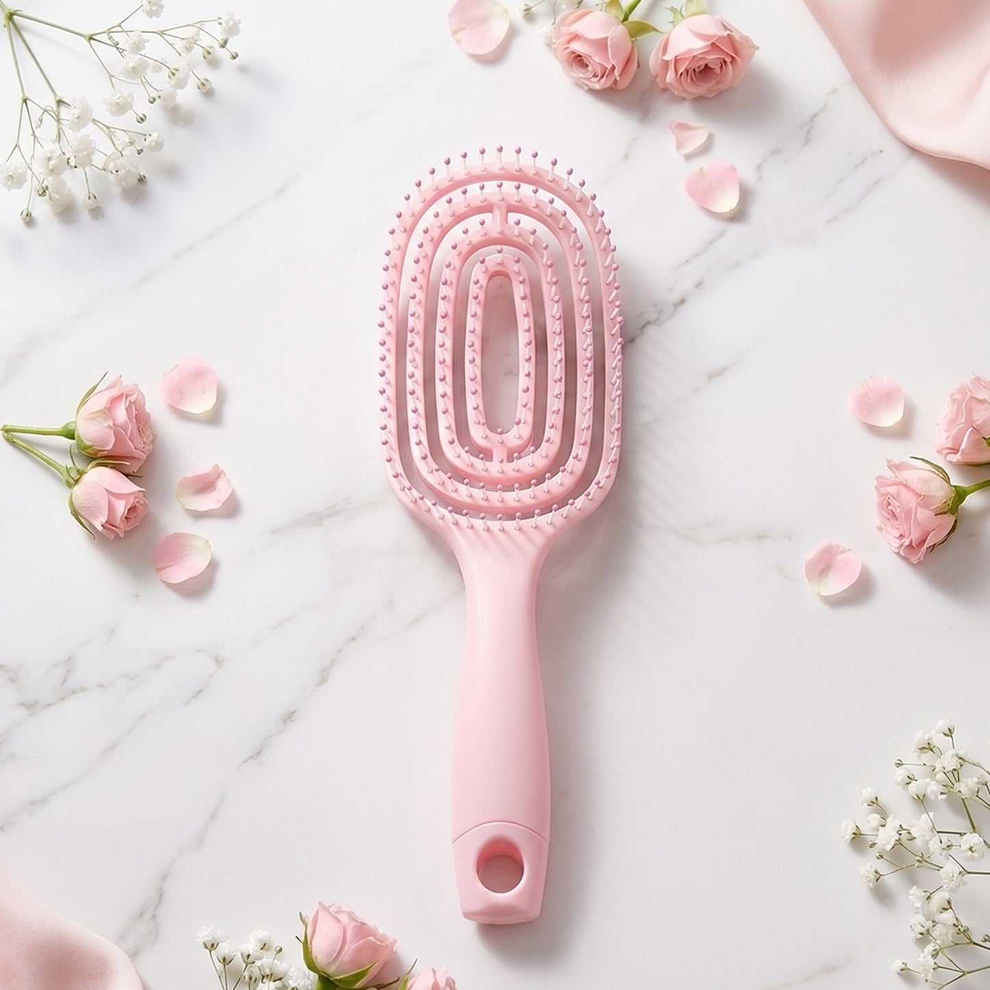 Side view showing ergonomic design of curved detangling hair brush