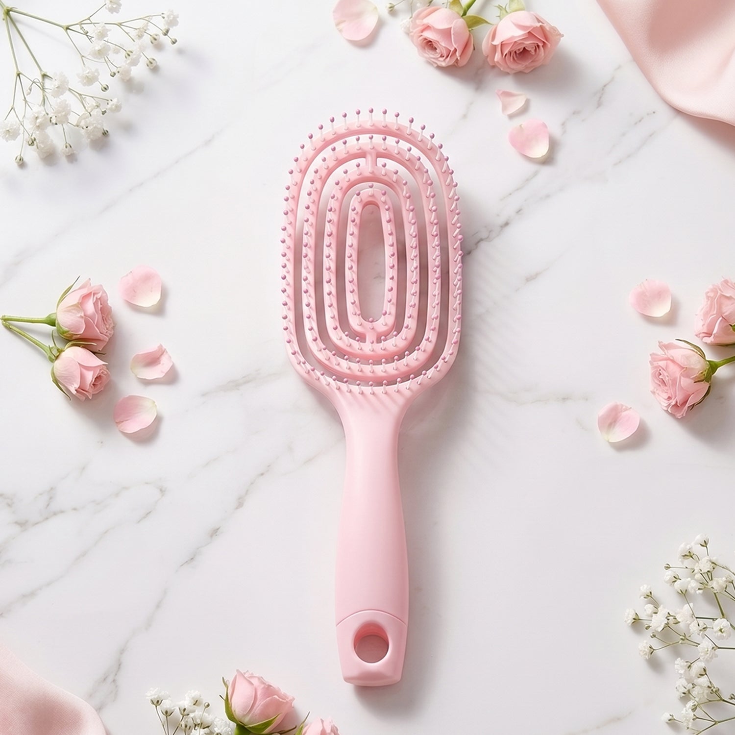 Side view showing ergonomic design of curved detangling hair brush