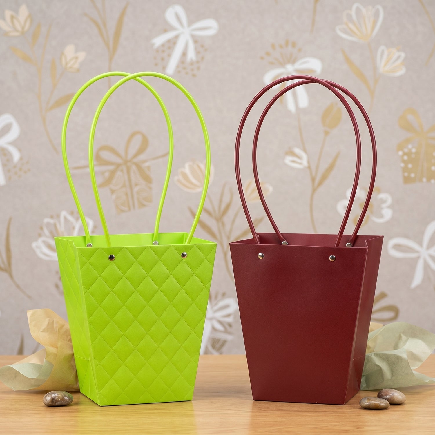 Close-up of curved handle and snap-button detail on flower bag