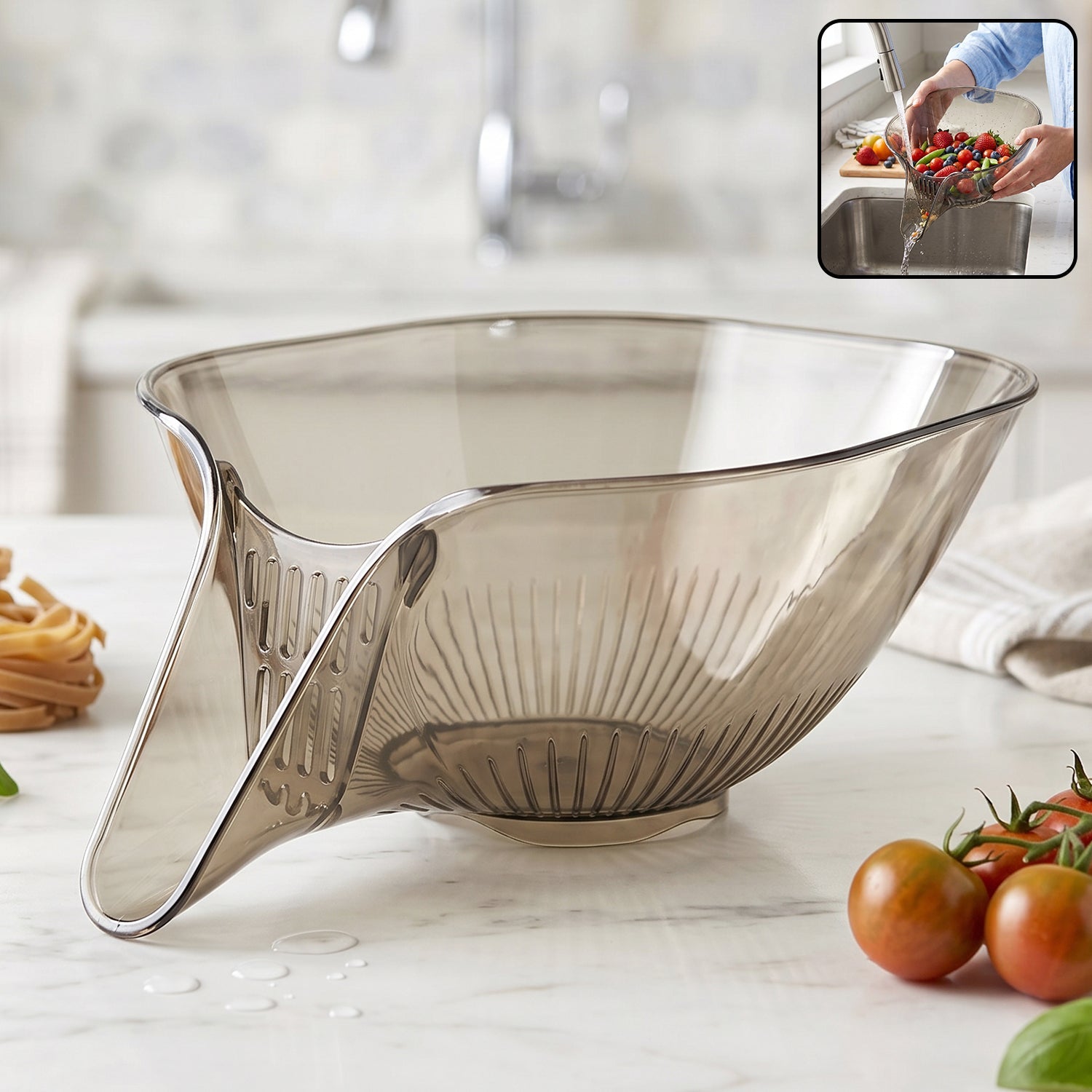 Multipurpose strainer basket in use for washing produce