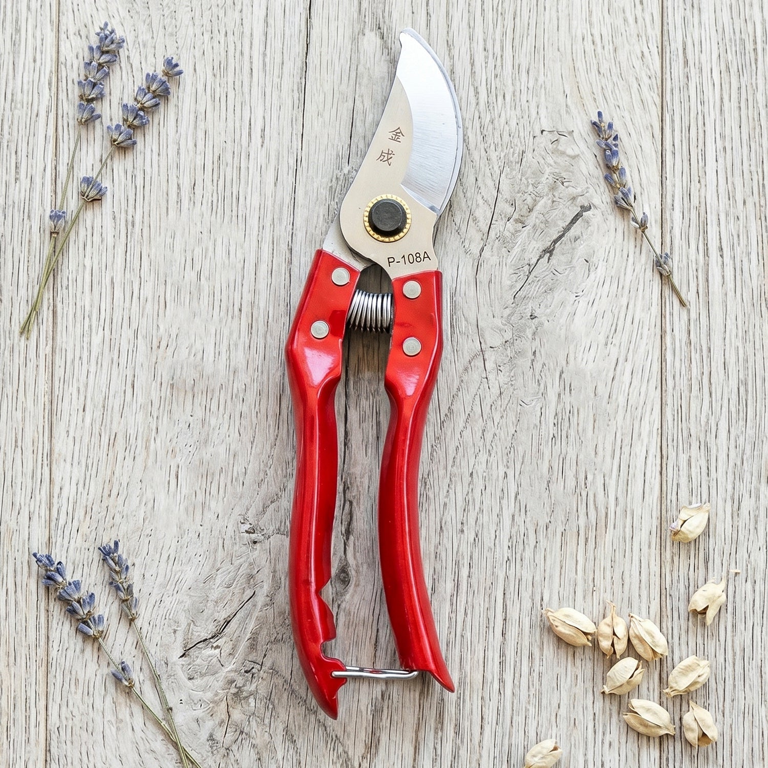 Garden pruning shears being used for plant trimming