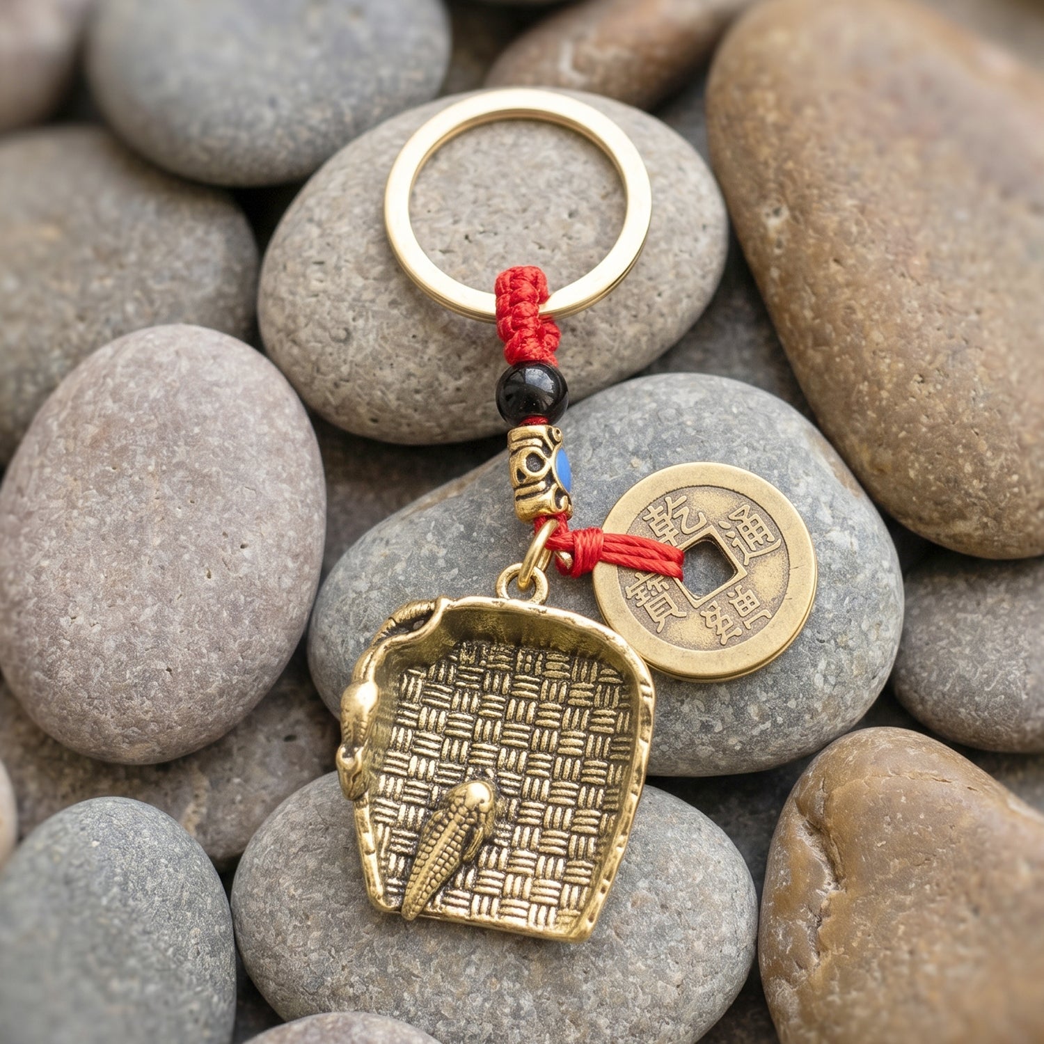 Feng shui lucky coin charm on red braided cord