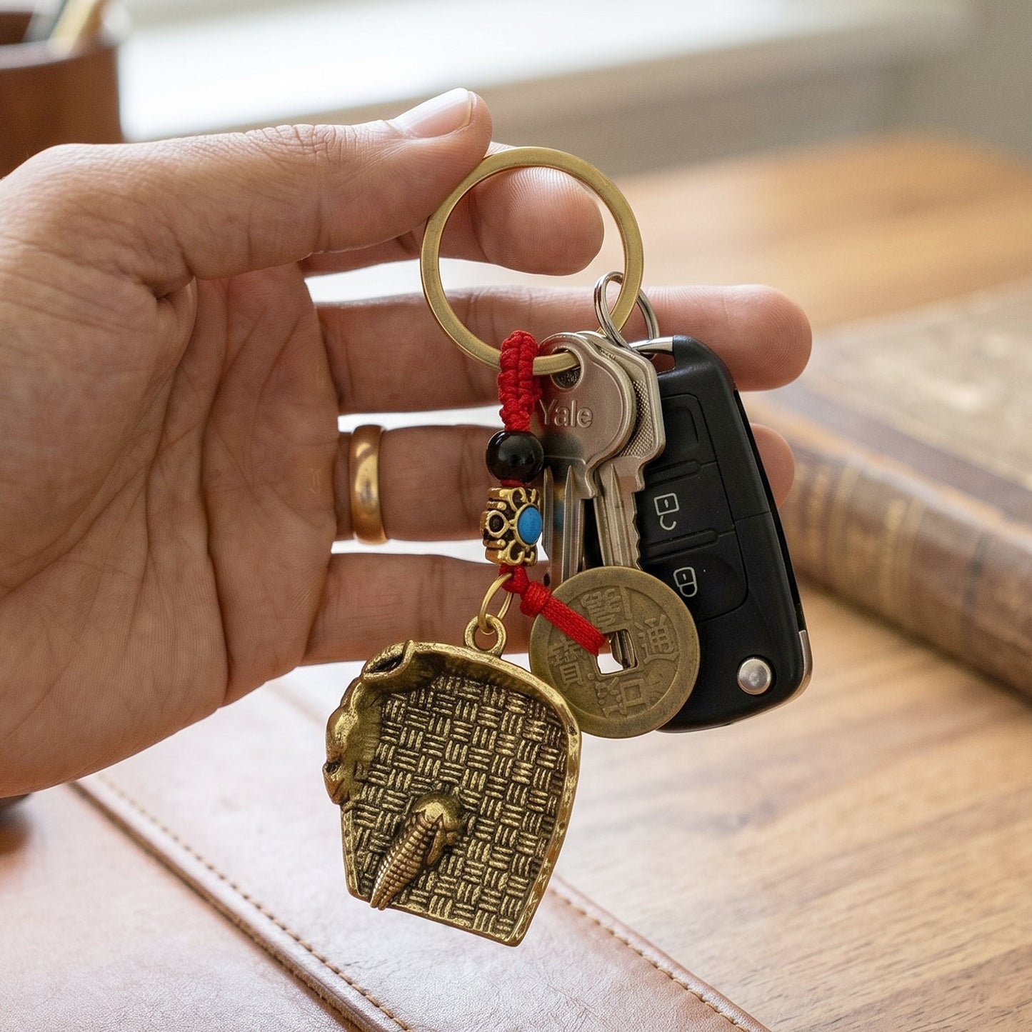 Hanging Feng Shui lucky coin keychain on bag
