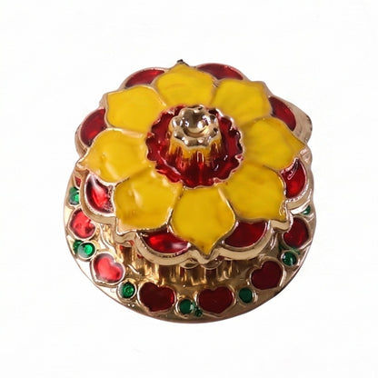 Temple decor with traditional kumkum box featuring gold finish