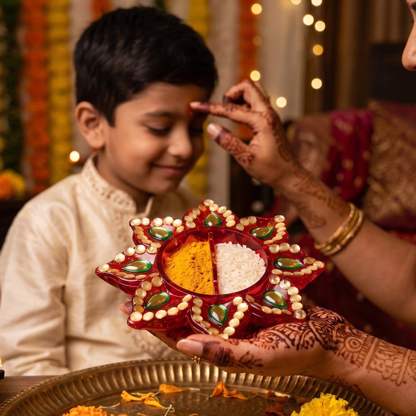 A festive pooja thali adorned with the beautiful kumkum dani.