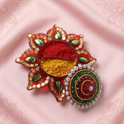 Decorative kumkum dani suitable for festival rituals.
