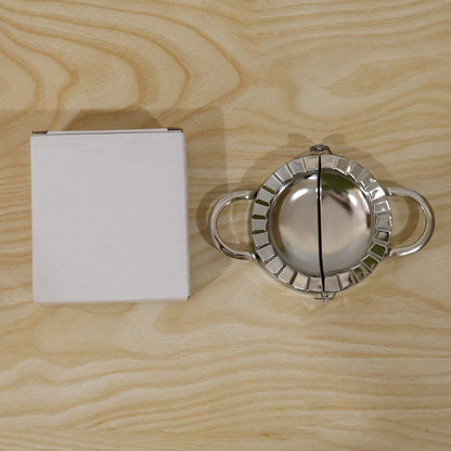 Daily use stainless steel dumpling maker on kitchen counter