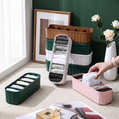 Organizing socks, underwear, and ties with plastic divider trays