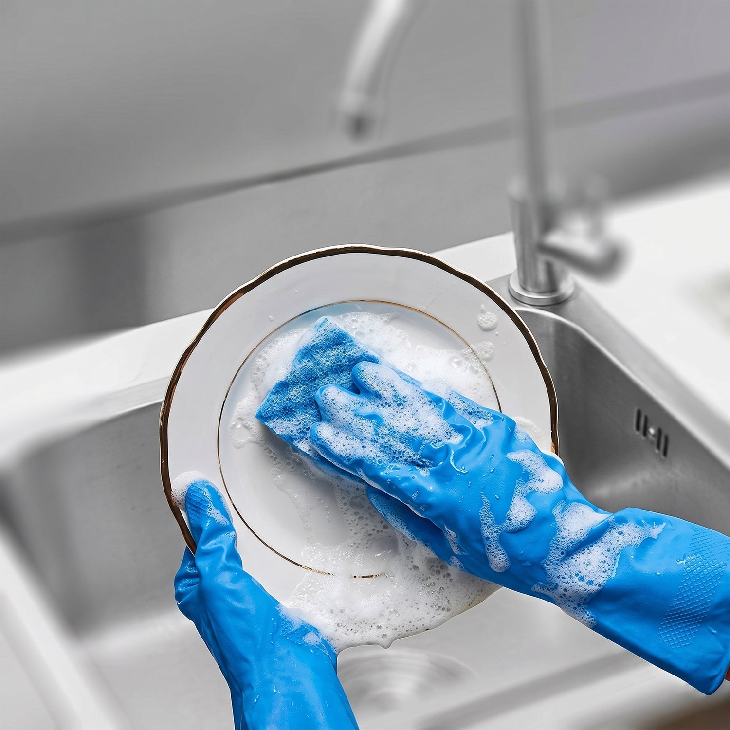 Reusable blue rubber gloves for kitchen cleaning