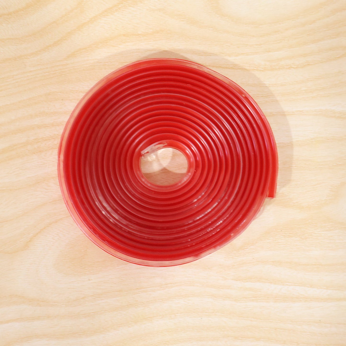 Baby safety edge protector in use on furniture
