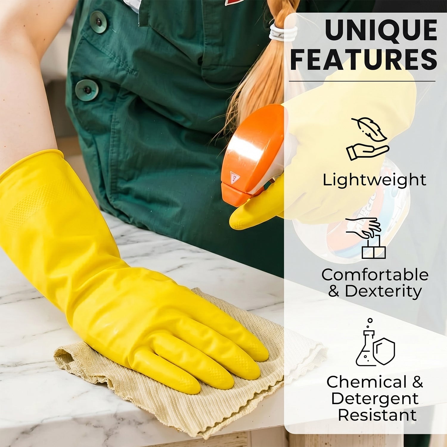 Yellow household cleaning gloves in use for kitchen cleaning