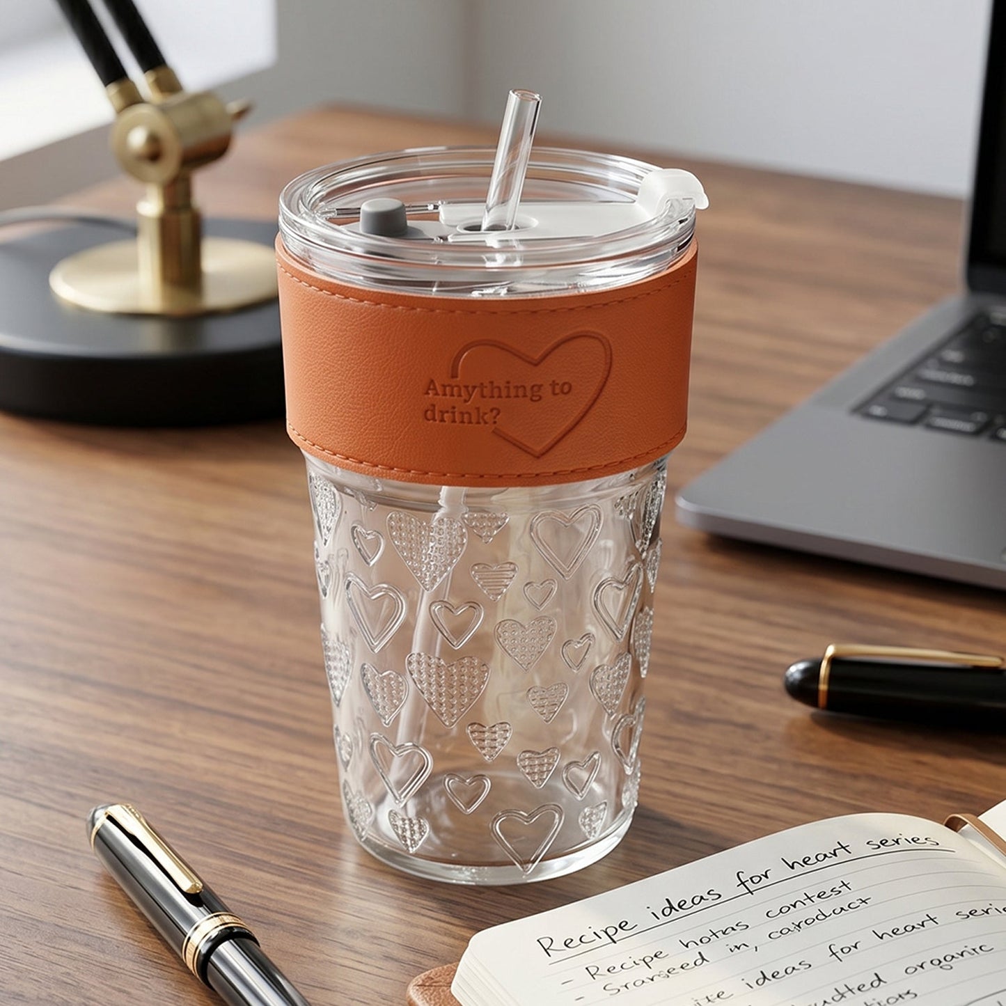 Glass tumbler on a desk with plants, suitable for home or office use