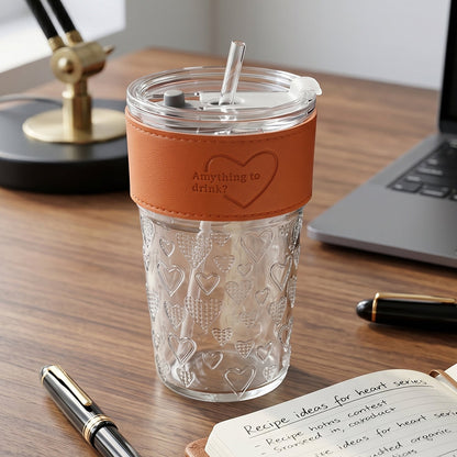 Glass tumbler on a desk with plants, suitable for home or office use