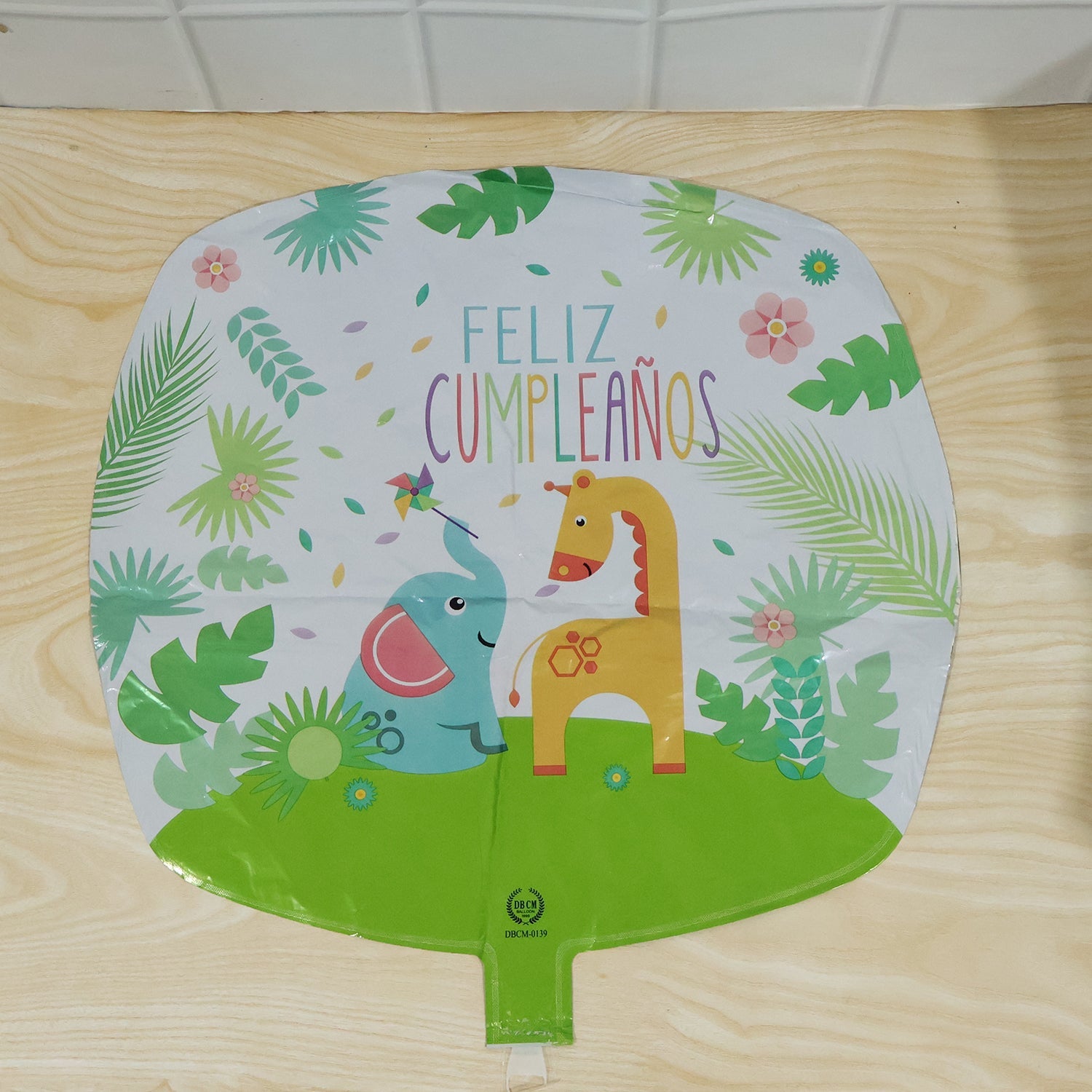 Birthday party with jungle lion foil balloon decorations
