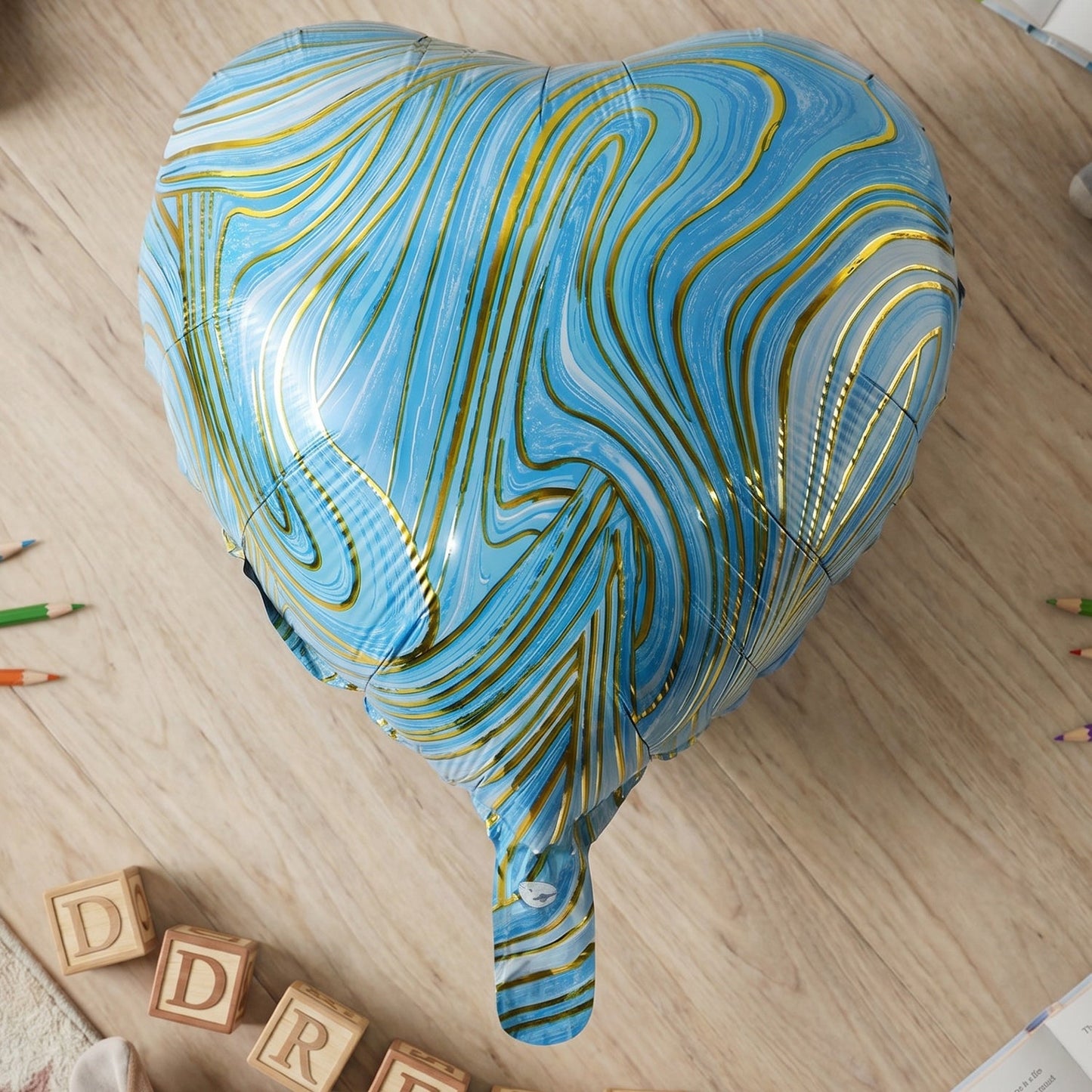 Blue marble heart balloon for photo corner