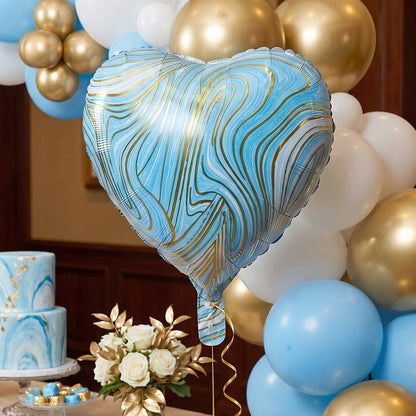 Blue heart foil balloon backdrop for birthday parties