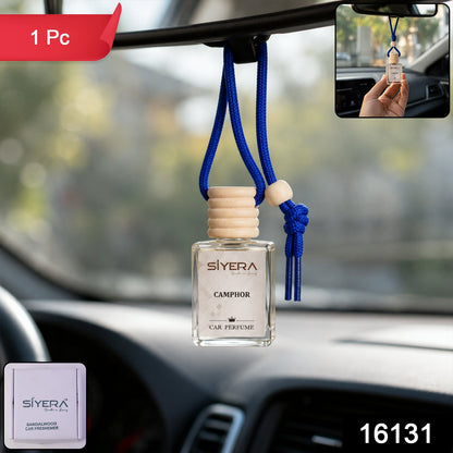 Car perfume with wooden cap in a sleek glass bottle
