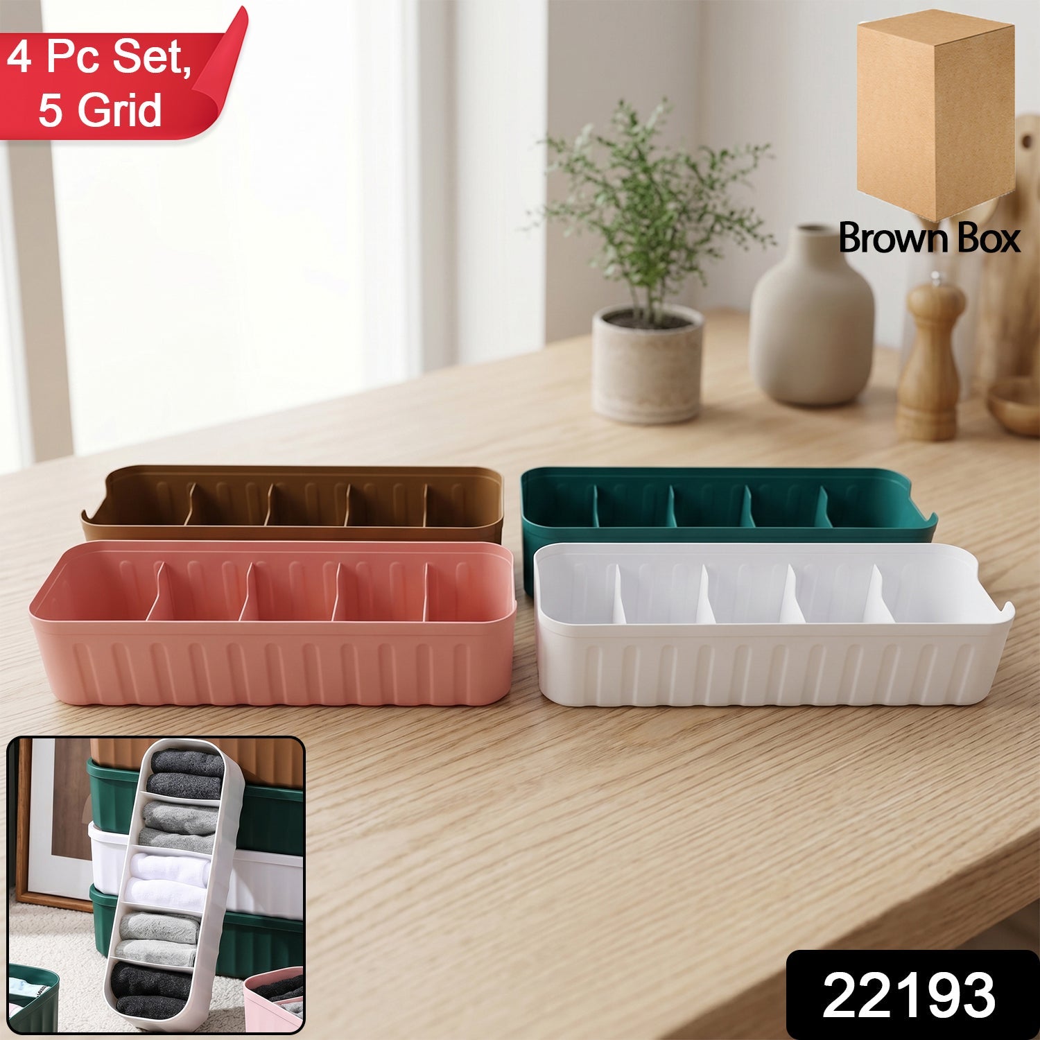 Pack of four plastic drawer organizer trays in assorted colours