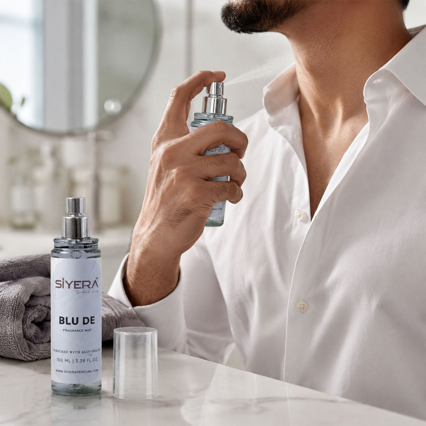 Fragrance mist spray detail showcasing fine mist application
