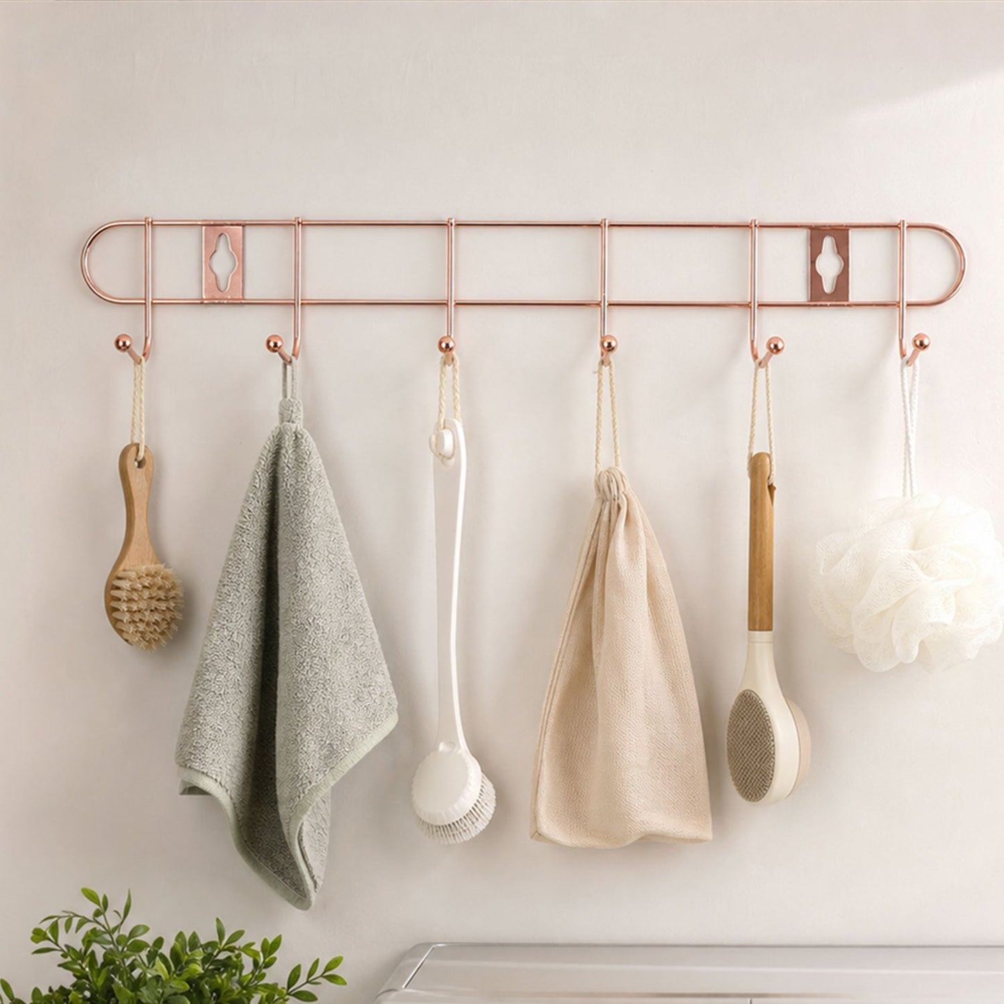 Wall mounted hook rail for towels and utensils
